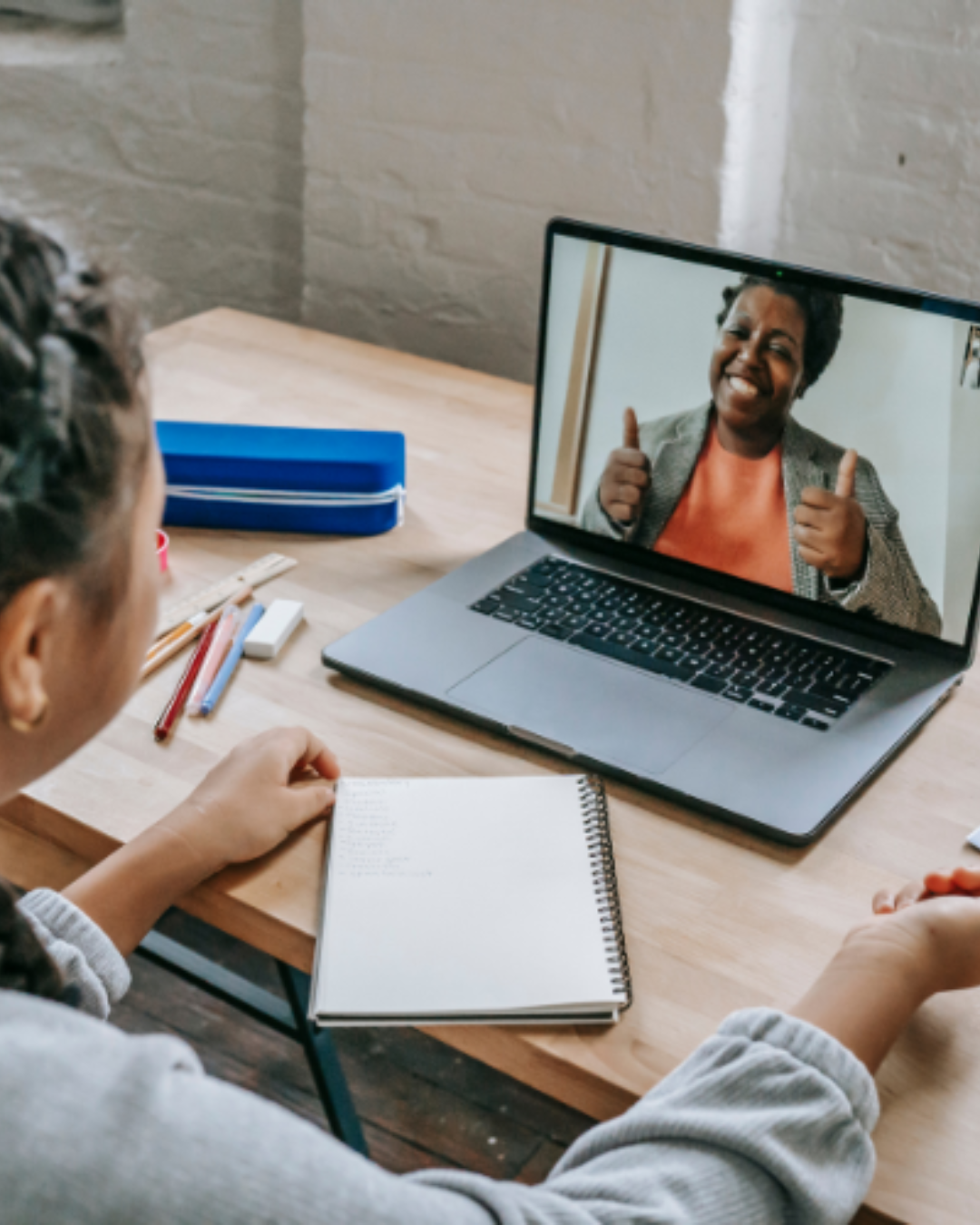 Student meeting a tutor over a video call